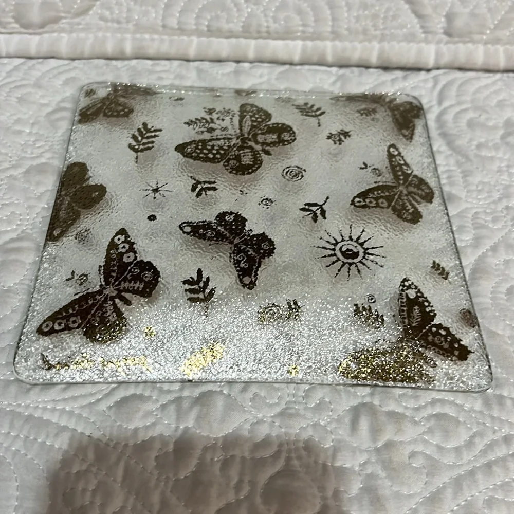 Set of four Georges‎ Briard square plates